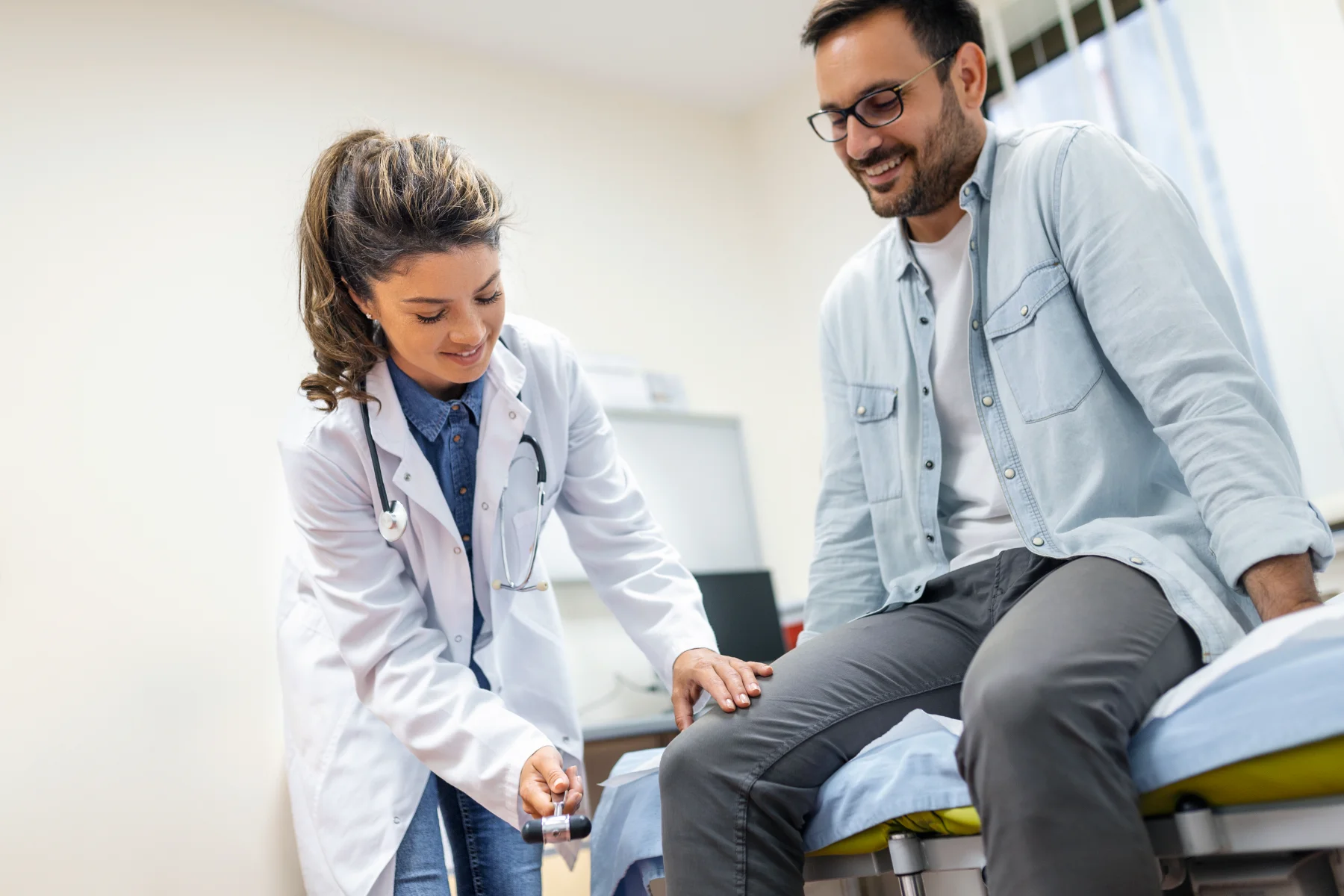 Dr. Anshul consulting with a patient